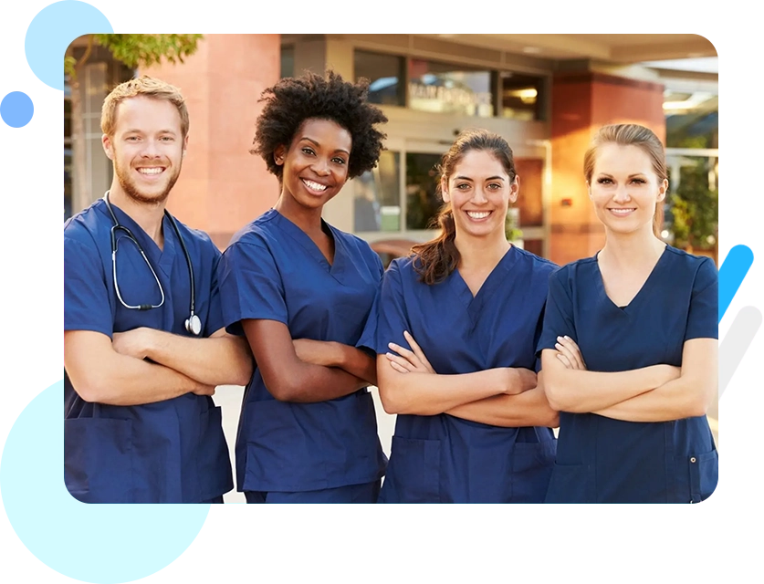 A group of nurses standing next to each other.